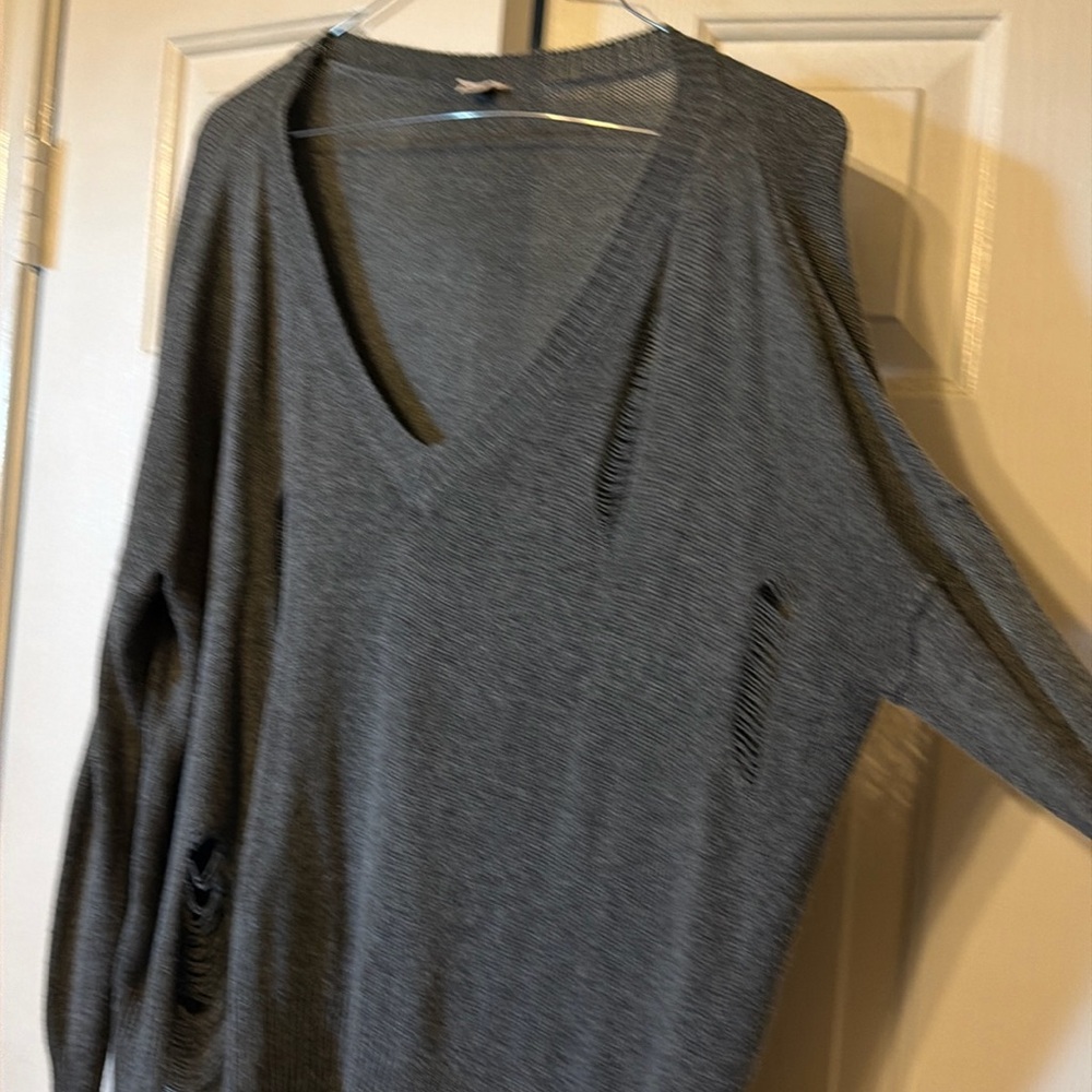 Sweater. Thin. Stylish. Size large .